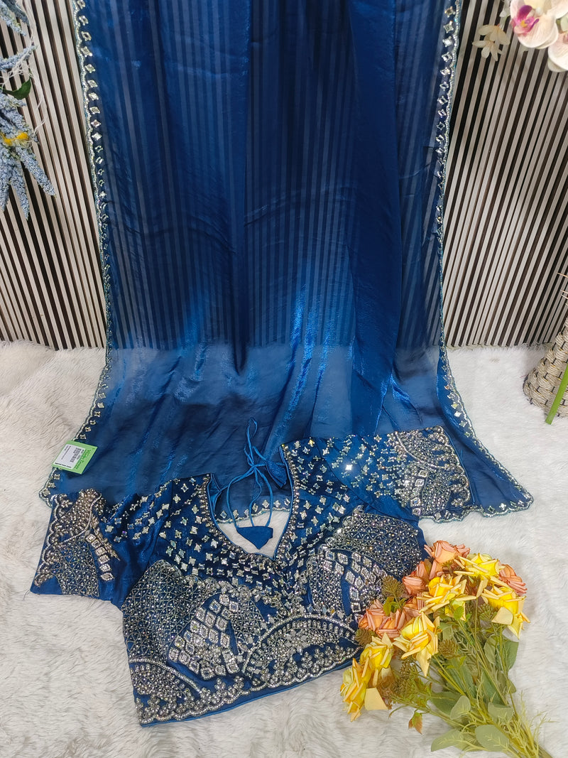 Shimmering Sage Green Organza Saree with Heavy Mirror Work Blouse
