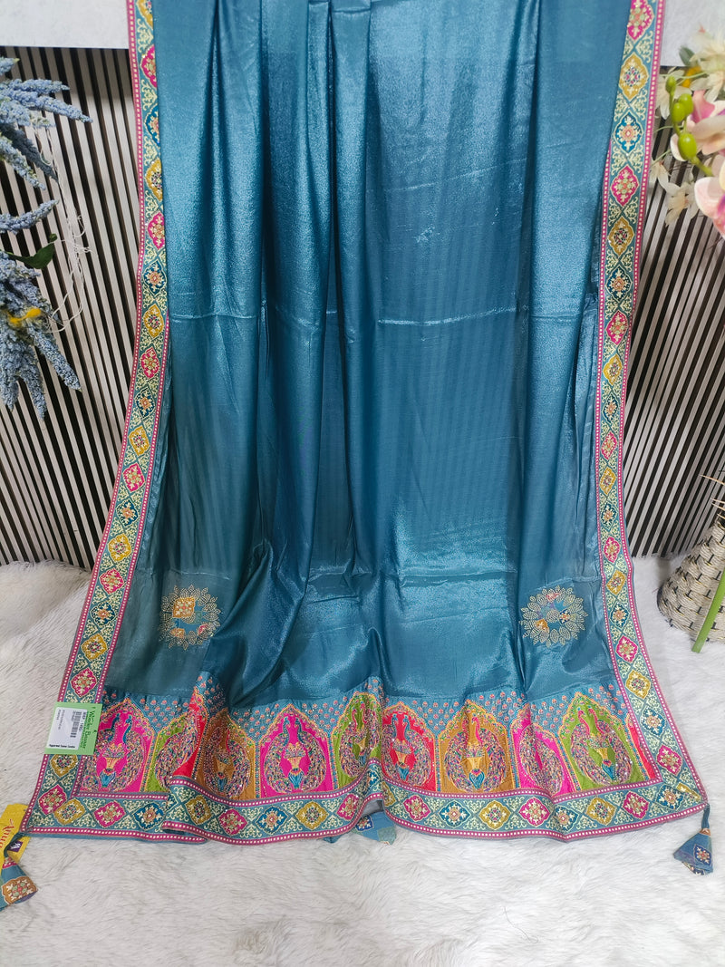 Ethereal Teal Blue Silk Blend Saree with Multi-Color Kalamkari Style Border