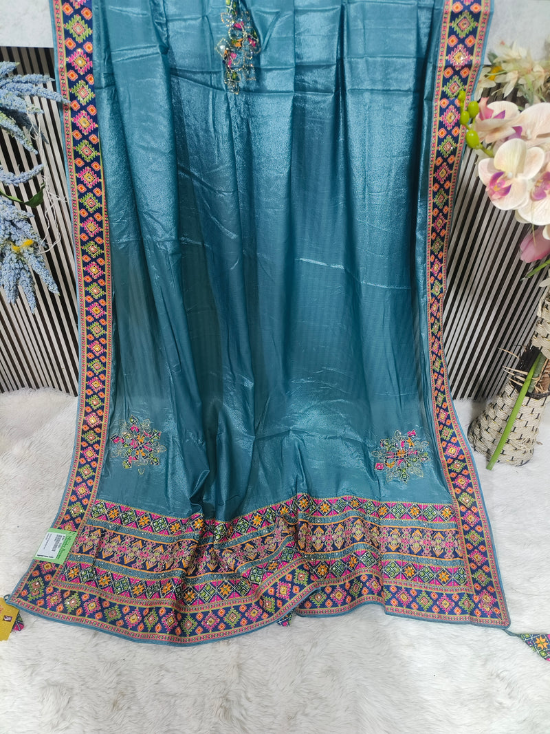 Elegant Dusty Rose Silk Saree with Intricate Multi-Color Geometric Border