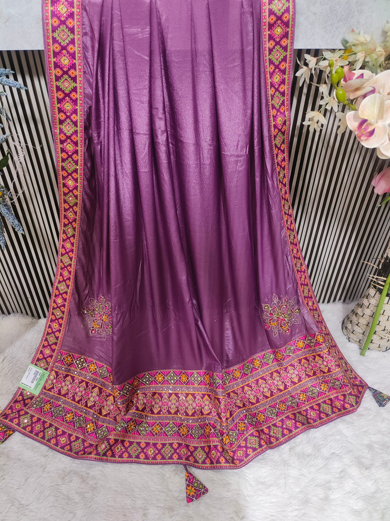 Elegant Dusty Rose Silk Saree with Intricate Multi-Color Geometric Border