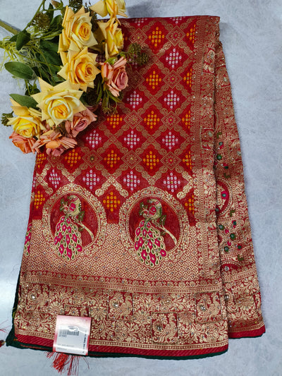Exquisite Red Bandhani Saree with Royal Peacock Motifs and Zari Border