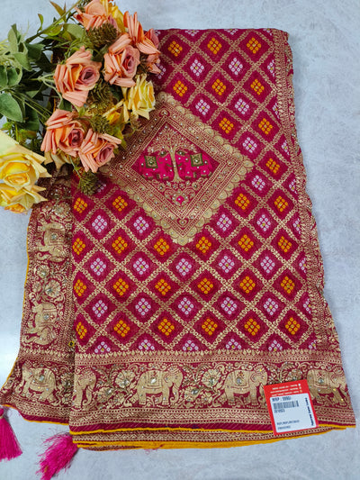 Majestic Magenta Silk Saree with Traditional Gold Elephant Motifs and Tassels