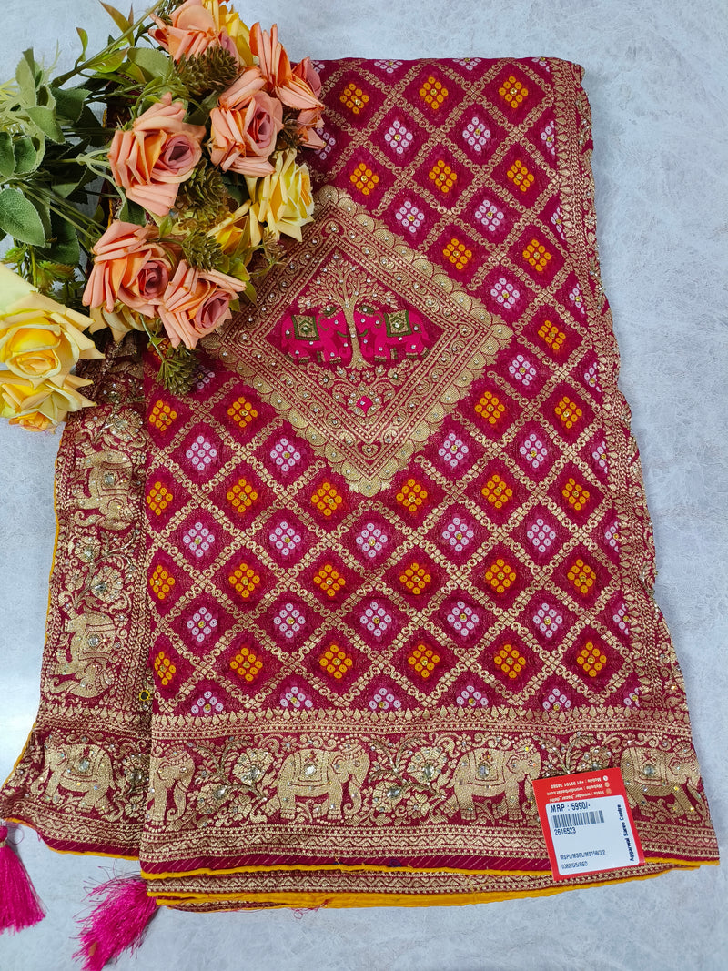 Majestic Magenta Silk Saree with Traditional Gold Elephant Motifs and Tassels