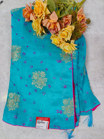 Enchanting Teal Blue Saree with Pink Floral Accents and Golden Zari