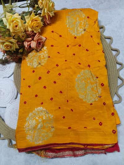Vibrant Mustard Yellow Georgette Saree with Red Bandhani Accents