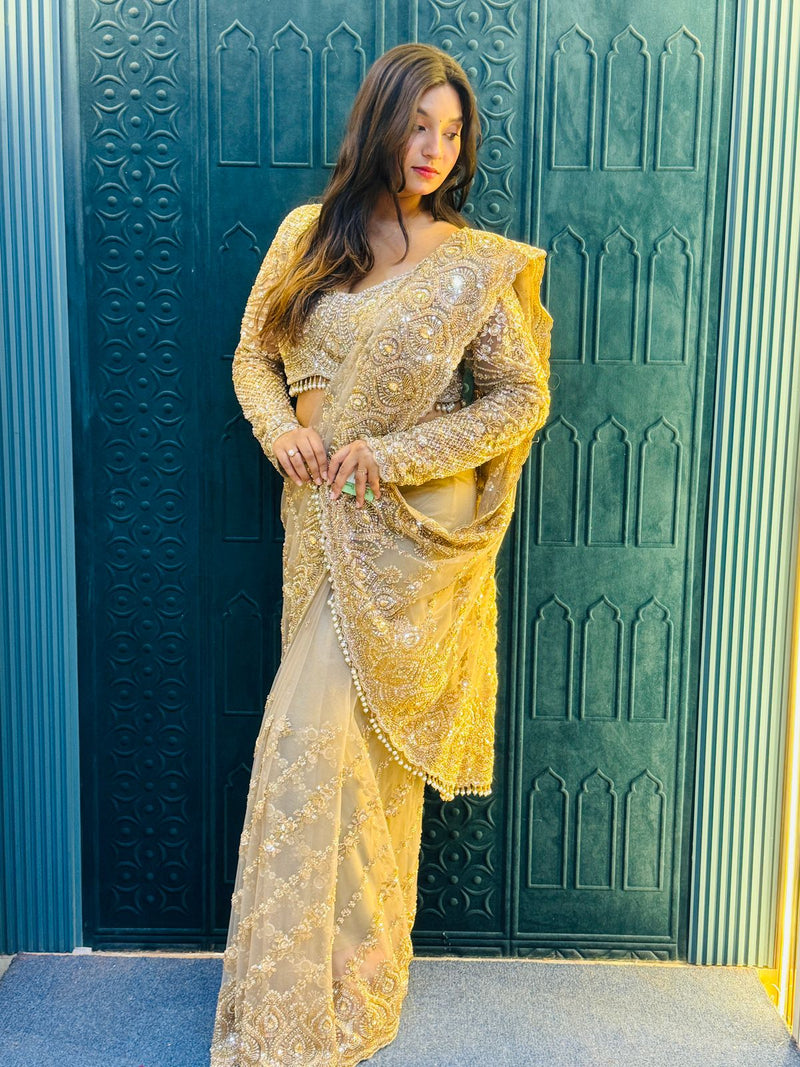 Glamorous Golden Sequin and Pearl Embellished Net Saree