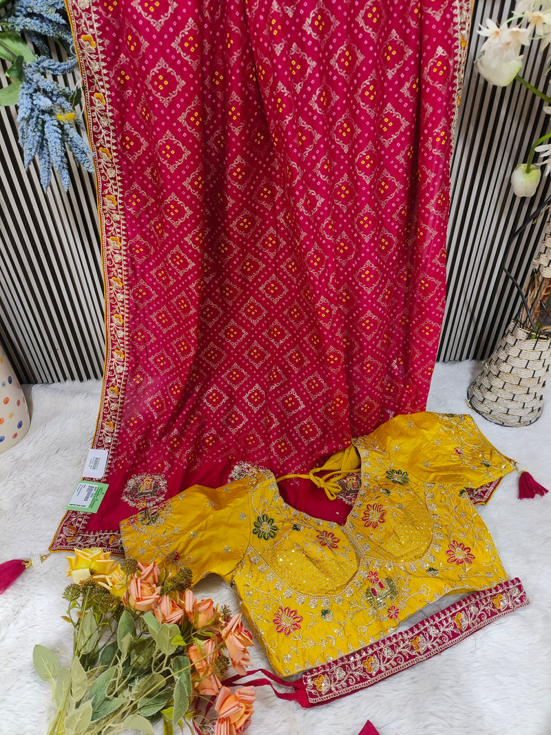 Traditional Red Bandhani Silk Saree with Contrasting Yellow Embroidered Blouse