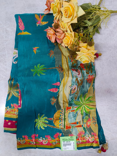 Vibrant Teal Blue Silk Saree with Tropical Landscape and Swan Print