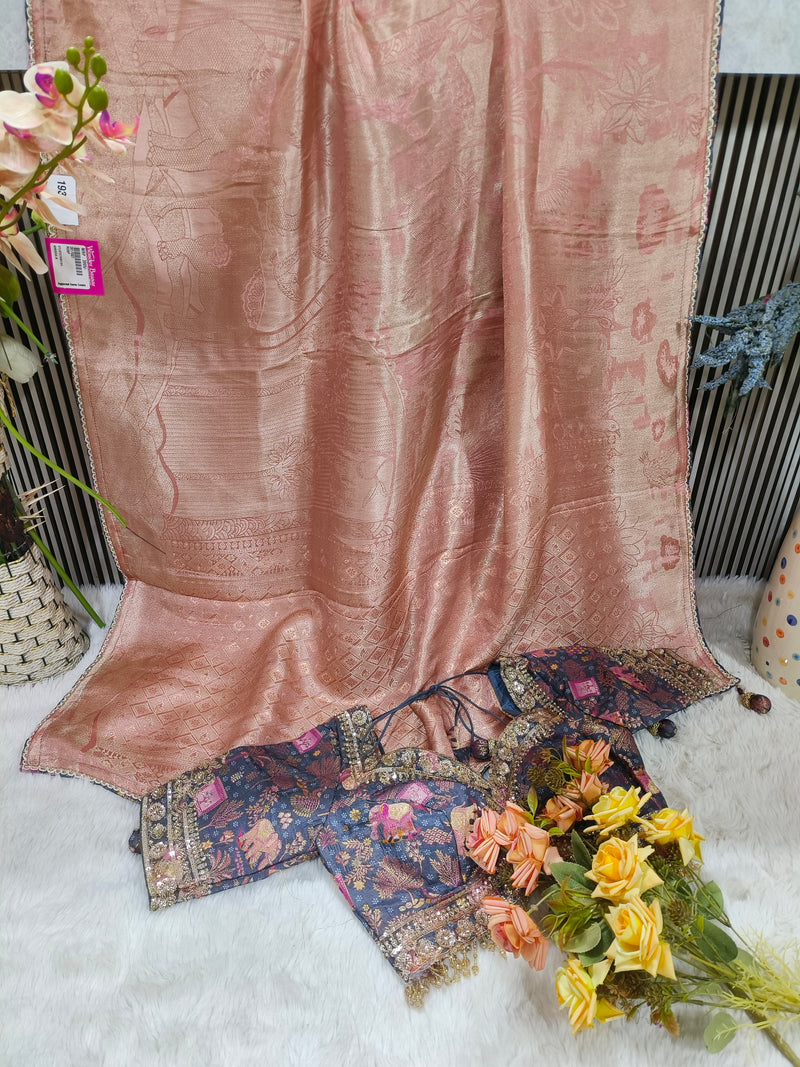 Radiant Cream Silk Saree with Intricate Elephant Motif Magenta Blouse