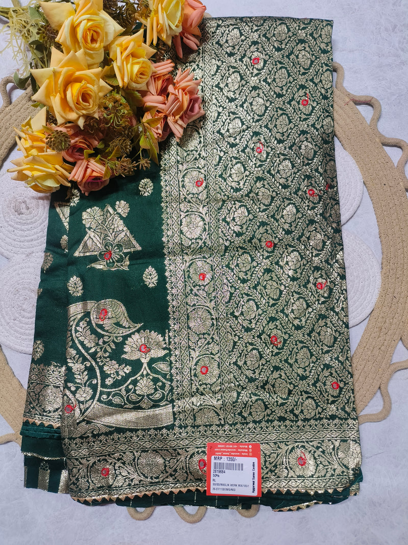 Enchanting Deep Green Silk Saree with Gold Zari Detail