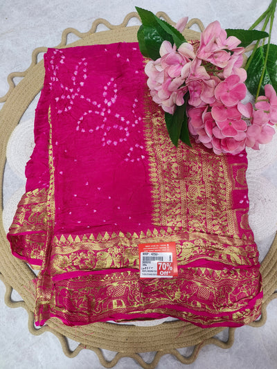 Glamorous Hot Pink Bandhani Print Saree with Heavy Gold Border