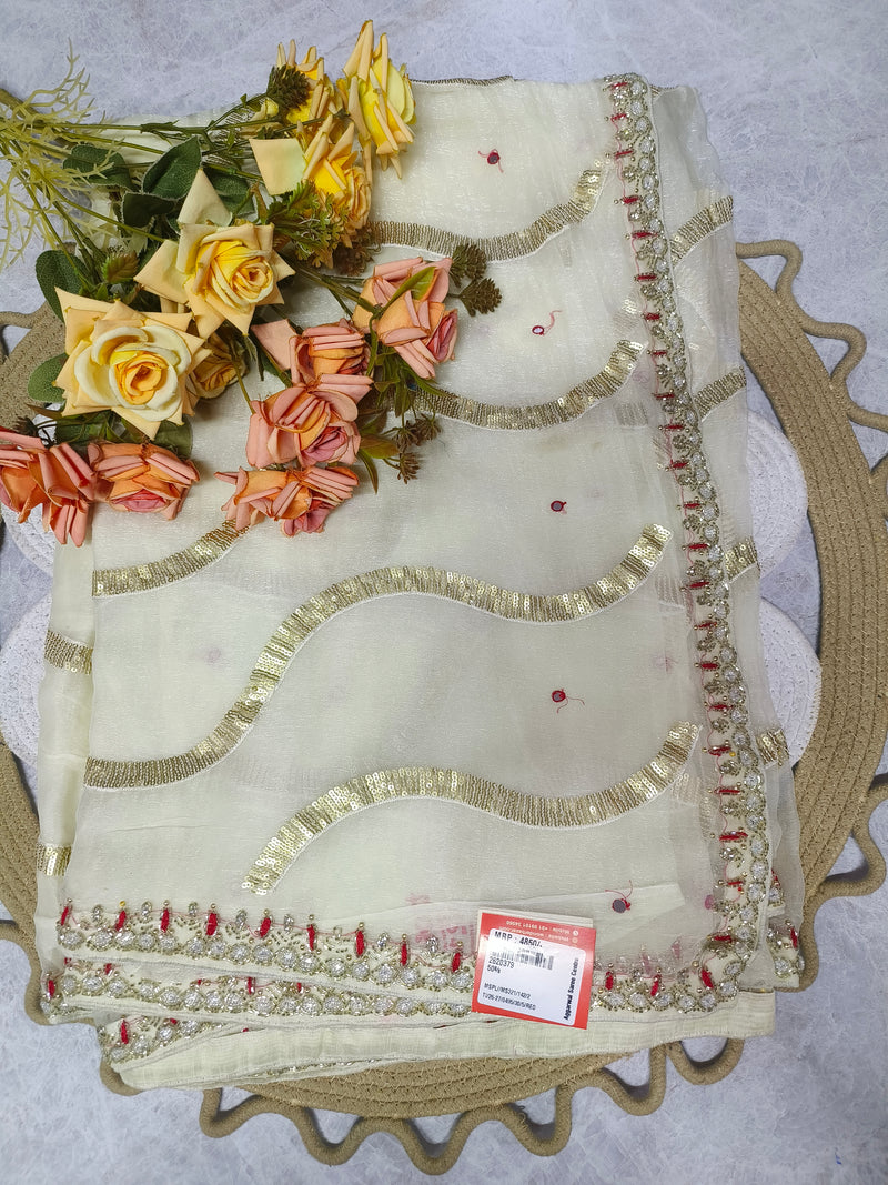 Graceful Ivory Saree with Golden Wave Embroidery and Border Trim