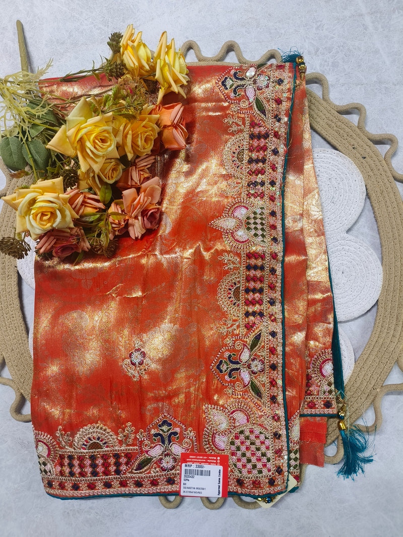 Lustrous Orange and Gold Shimmer Saree with Heavy Ethnic Embellishment