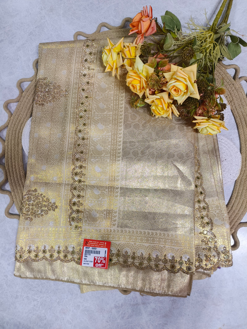 Regal Gold-Toned Festive Saree with Delicate Shimmering Detail