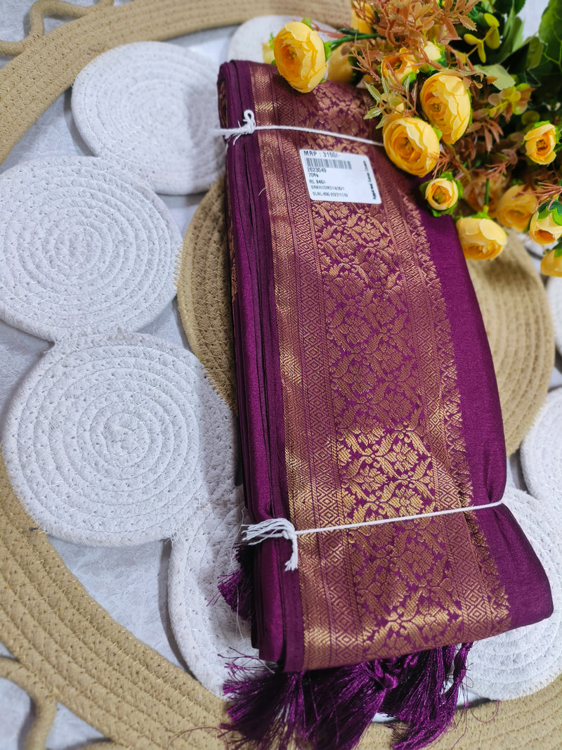 Elegant Deep Magenta Traditional Saree with Intricate Gold Zari Border