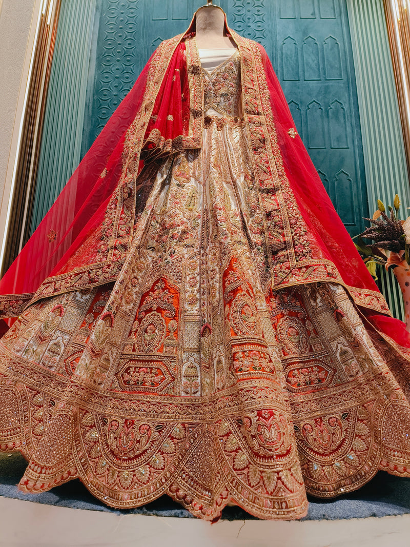 Exquisite Crimson Bridal Lehengas with Intricate Gold Zari Embellishments