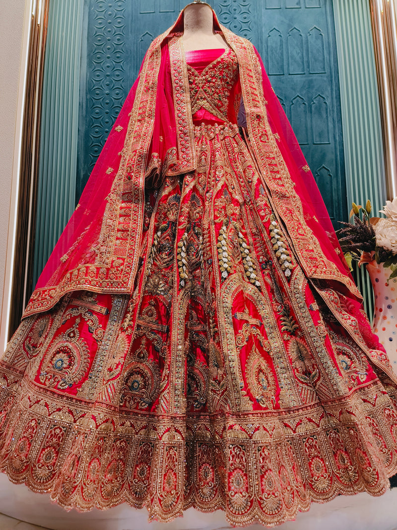 Majestic Red Bridal Lehenga with Heavy Embellished Detailing