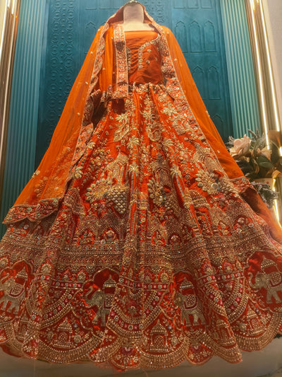 Dazzling Crimson Bridal Lehenga with Intricate Metallic Detailing