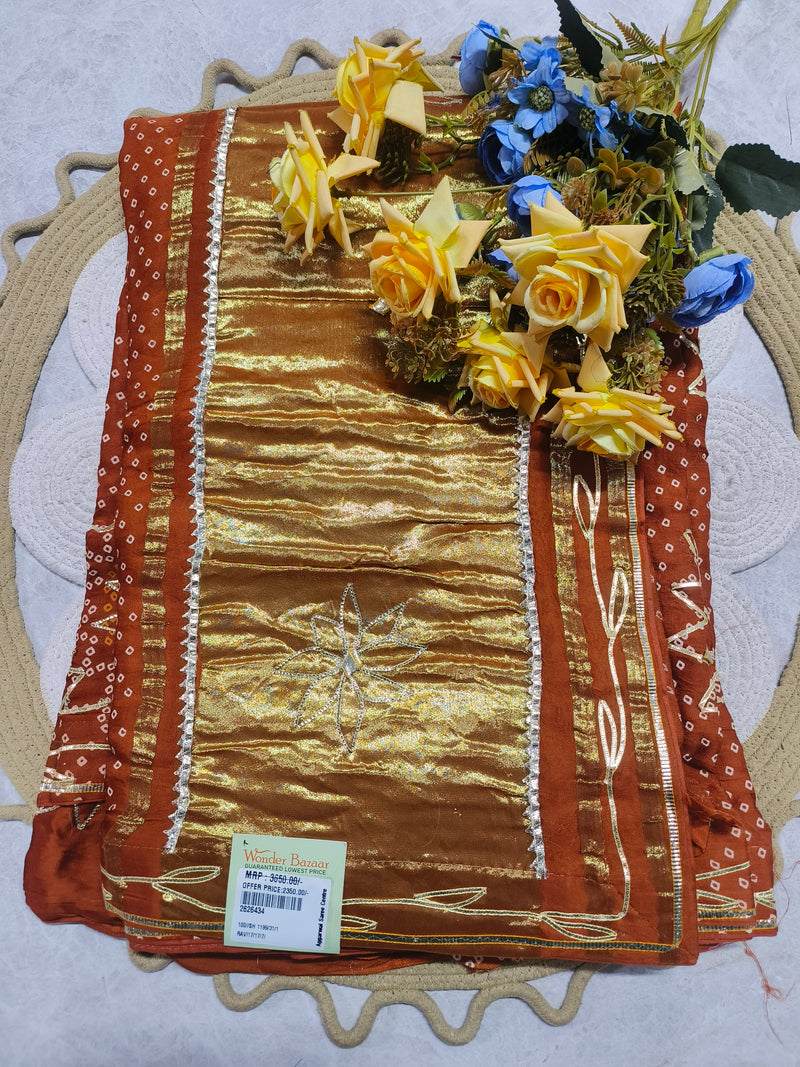 Elegant Burnt Orange Bandhani Saree with Radiant Golden Zari Highlights