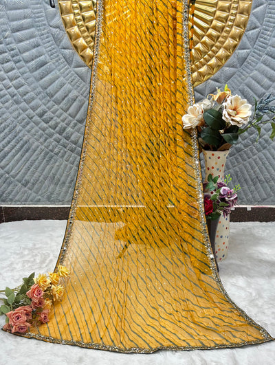 Radiant Yellow Leheriya Georgette Saree with Dazzling Mirror Work