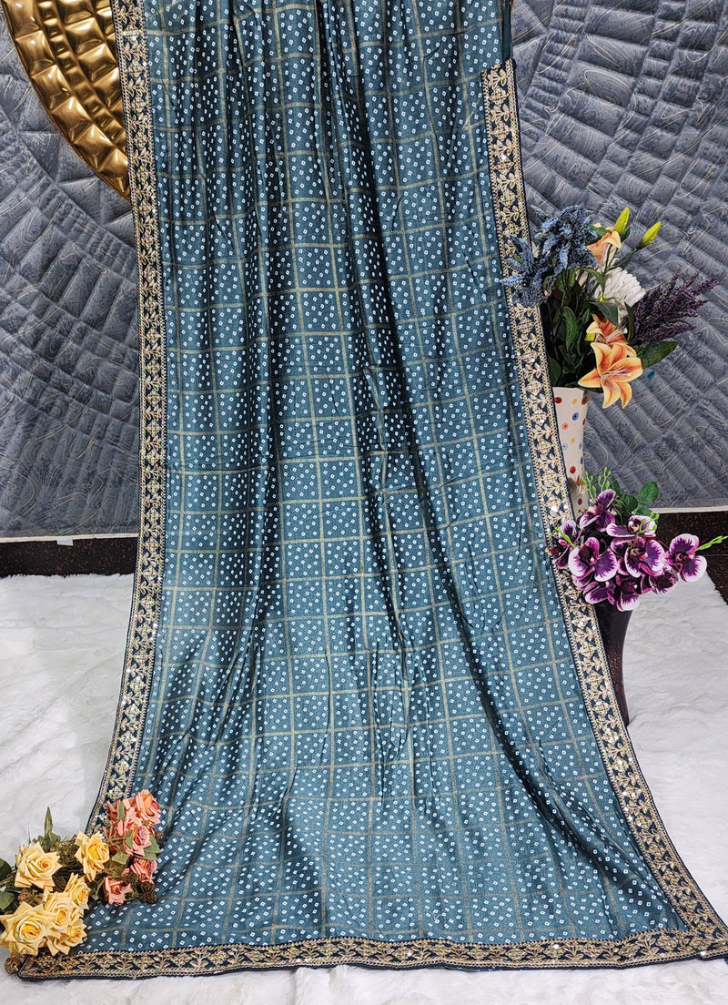 Elegant Teal Blue Bandhani Print Saree with Sequin Embroidered Border