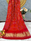 Radiant Red Bandhani Georgette Saree with Gold Zari Border